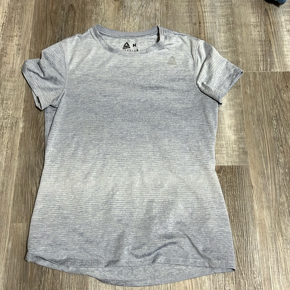 Light blue Reebok shirt size medium